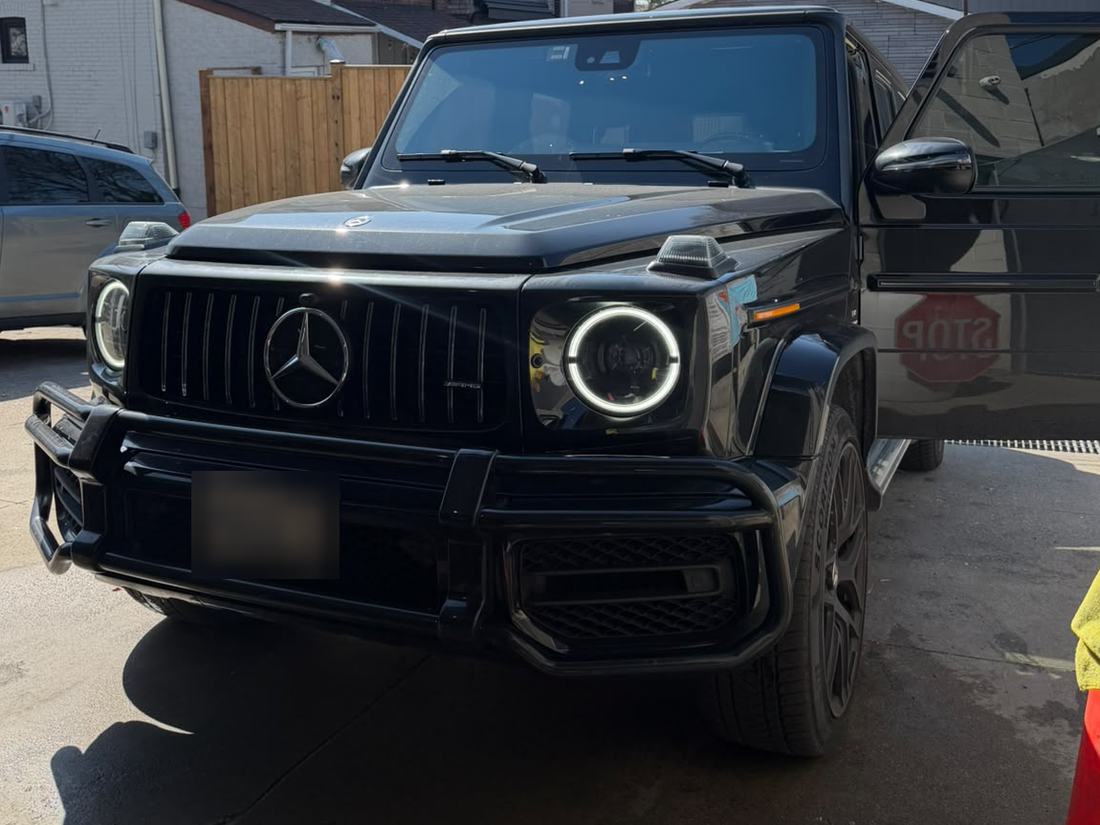 Black Mercedes-AMG G63 after a hand wash at Splash N Shine on Danforth Avenue, Toronto