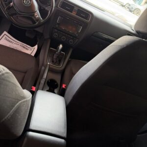 Clean car interior with dash, console and seats wiped at Splash N Shine
